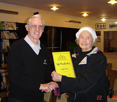 Heather May awarded Life Membership in 2010 by Athletics NZ President Jim Blair